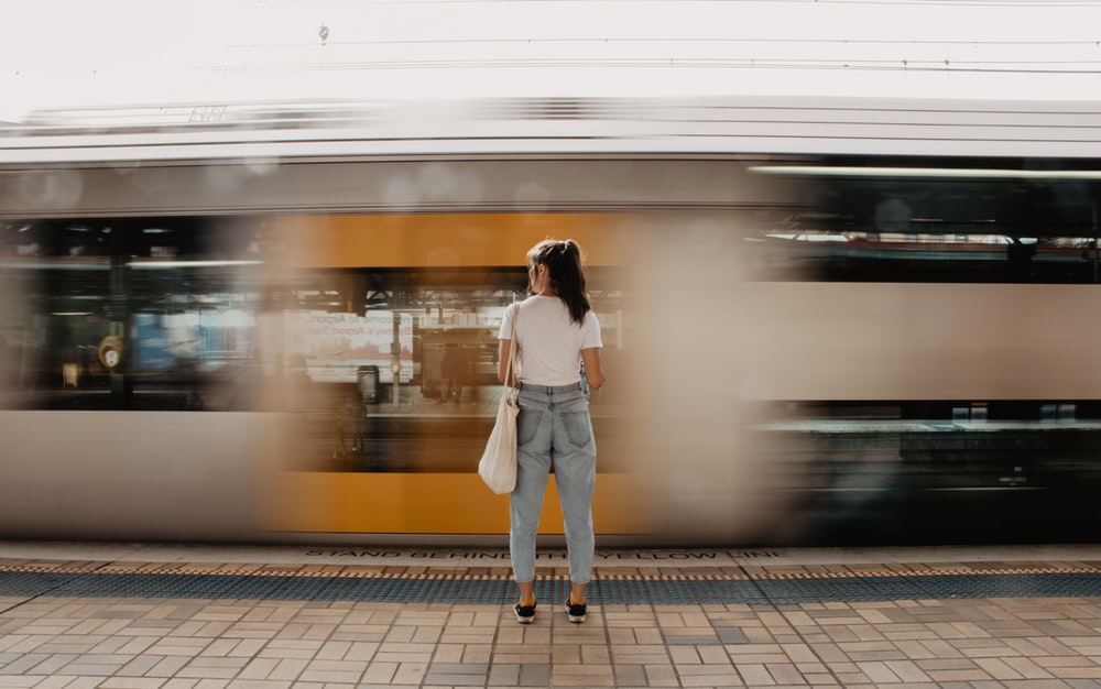 woman standing on pavement