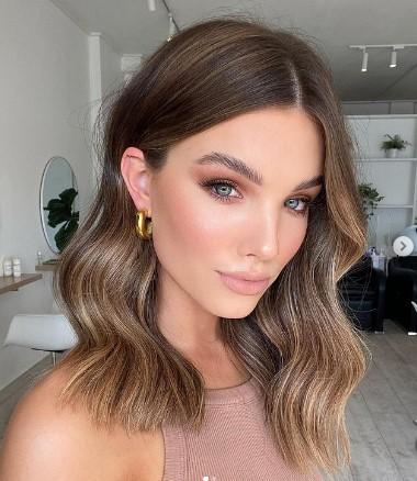 A picture containing wall, person, indoor, clothing Description automatically generated